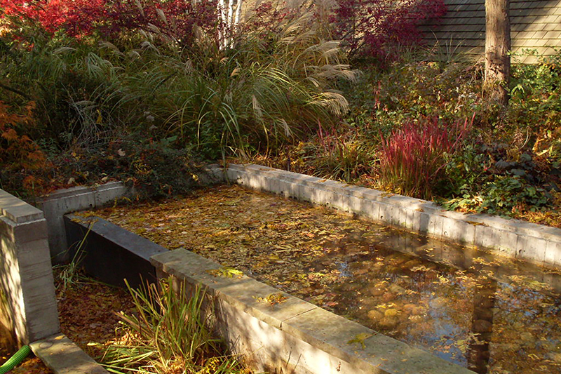 Residential garden fountain being cleaned and serviced in Toronto