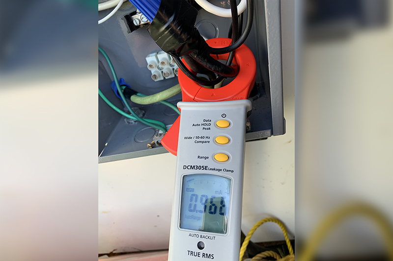 Electrical amperage readings taken on a floating fountain control panel
