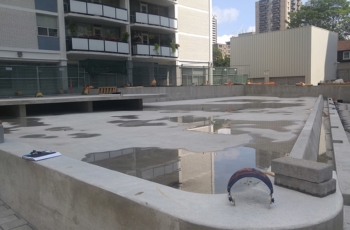 After the floors and walls have been completed the outer concrete shell of the fountain is exposed and is ready for an engineered waterproofing system.