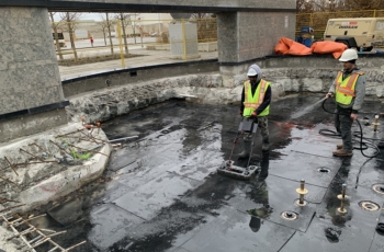 After the waterproofing is installed protection board is installed and a electromagnetic waterproofing testing is done to ensure a tight seal.
